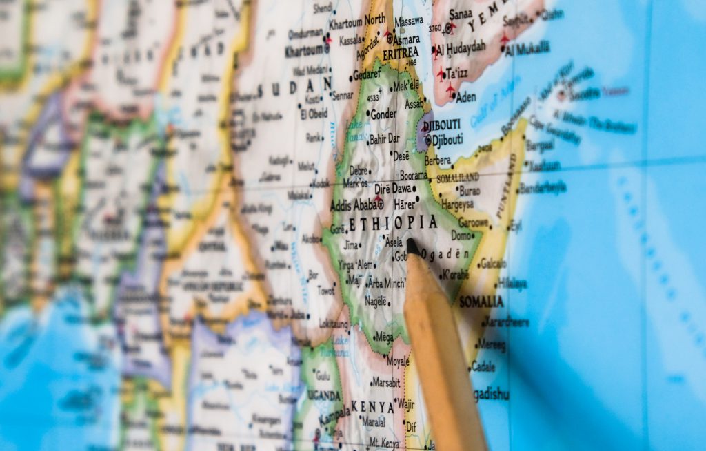 Pencil on a map pointing to a Ethiopia
